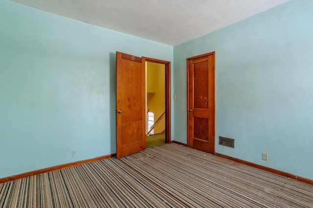 123 Thomas Hill Rd, Jackson, MN 56143 - carpeted spare room featuring baseboards and visible vents