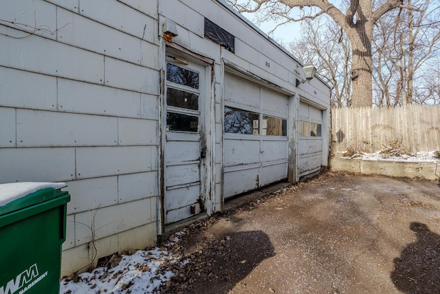 123 Thomas Hill Rd, Jackson, MN 56143 - view of home's exterior featuring fence and a garage