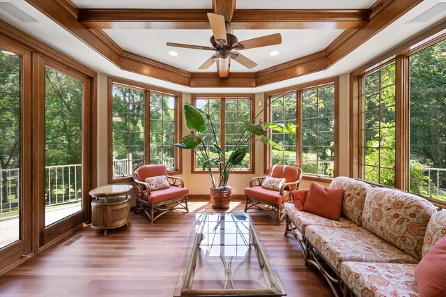 4325 Trillium Ln W, Minnetrista, MN 55364 - sunroom / solarium featuring coffered ceiling, healthy amount of natural light, french doors, wood finished floors, and ornamental molding