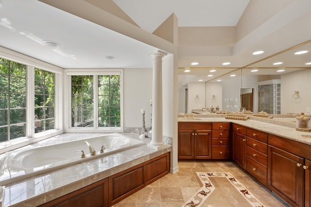 4325 Trillium Ln W, Minnetrista, MN 55364 - bathroom featuring a garden tub, vanity, decorative columns, and recessed lighting