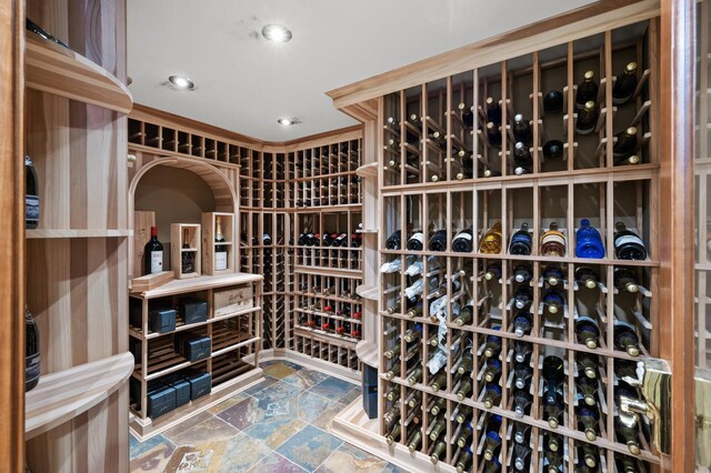 4325 Trillium Ln W, Minnetrista, MN 55364 - wine room with stone finish floors and recessed lighting