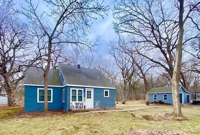 2085 Queens Ave S, Lakeland, MN 55043 - rear view of property with a lawn and stucco siding