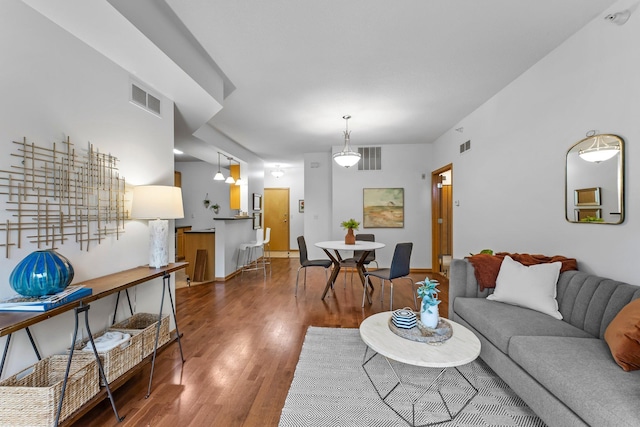 2565 Franklin Ave Unit 109, Saint Paul, MN 55114 - living room featuring wood finished floors and baseboards