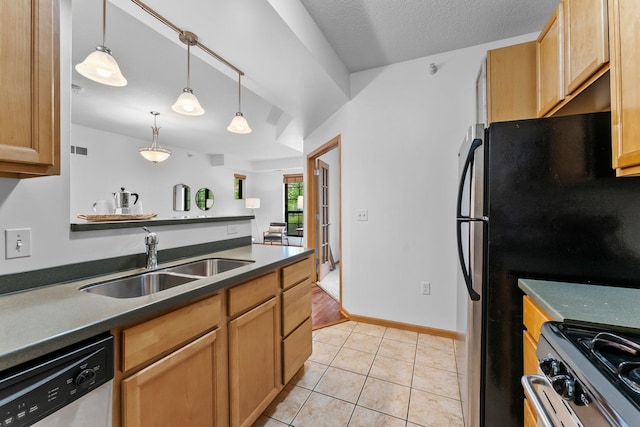 2565 Franklin Ave Unit 109, Saint Paul, MN 55114 - kitchen featuring appliances with stainless steel finishes, a sink, dark countertops, pendant lighting, and light tile patterned flooring