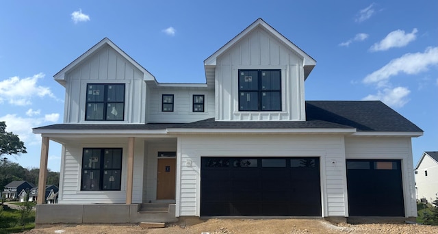 6200 Harkness Alcove S, Cottage Grove, MN 55016 - modern farmhouse style home with board and batten siding, covered porch, an attached garage, and driveway