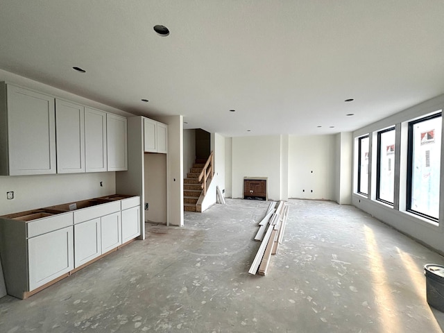 6200 Harkness Alcove S, Cottage Grove, MN 55016 - unfurnished living room featuring stairway