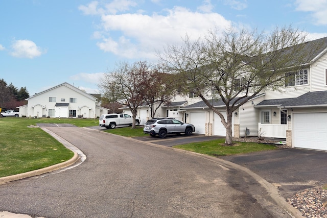 view of street with a residential view and curbs