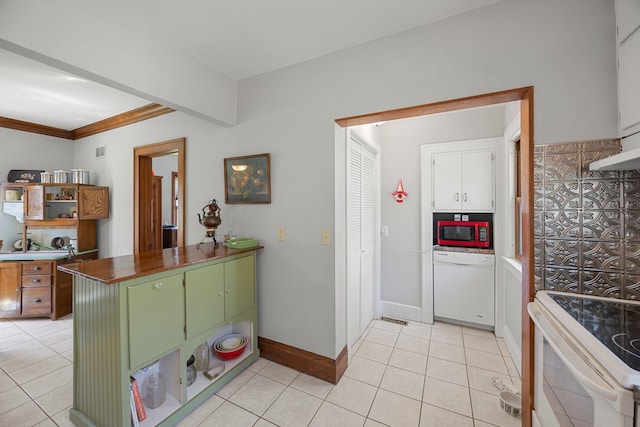 1114 6th St, Mankato, MN 56001 - kitchen with white appliances, green cabinets, open shelves, light tile patterned floors, and baseboards