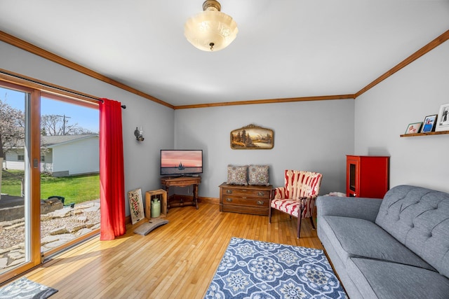1114 6th St, Mankato, MN 56001 - living area featuring crown molding, hardwood / wood-style flooring, and baseboards