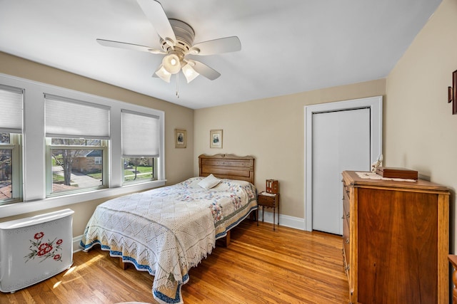 1114 6th St, Mankato, MN 56001 - bedroom with baseboards, wood finished floors, and ceiling fan