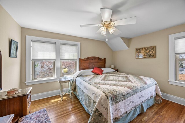 1114 6th St, Mankato, MN 56001 - bedroom featuring wood finished floors, baseboards, and ceiling fan