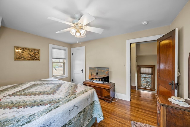 1114 6th St, Mankato, MN 56001 - bedroom featuring wood finished floors, baseboards, and a ceiling fan
