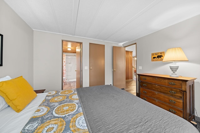 bedroom featuring ensuite bathroom