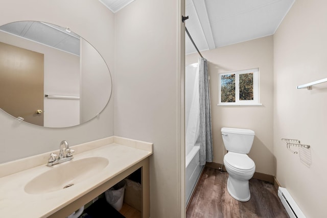 full bath with wood finished floors, toilet, vanity, shower / bath combo with shower curtain, and baseboard heating
