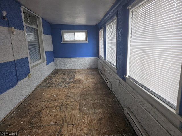 414 33rd Ave N, Minneapolis, MN 55412 - unfurnished room with a baseboard heating unit