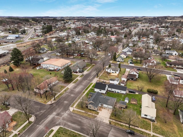 birds eye view of property with a residential view