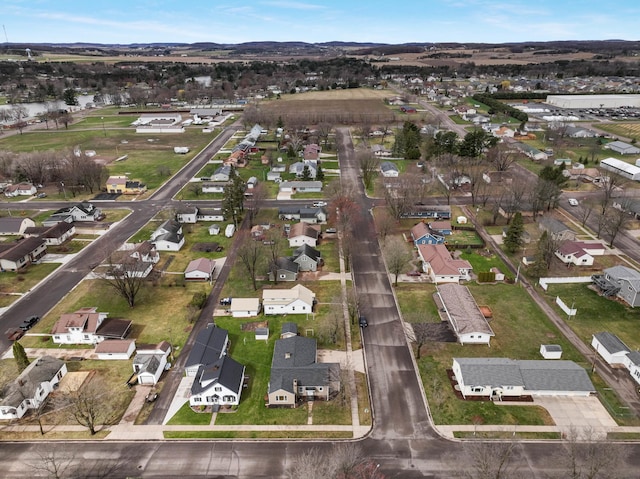 birds eye view of property with a residential view