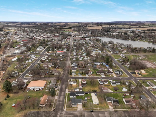 bird's eye view featuring a residential view and a water view