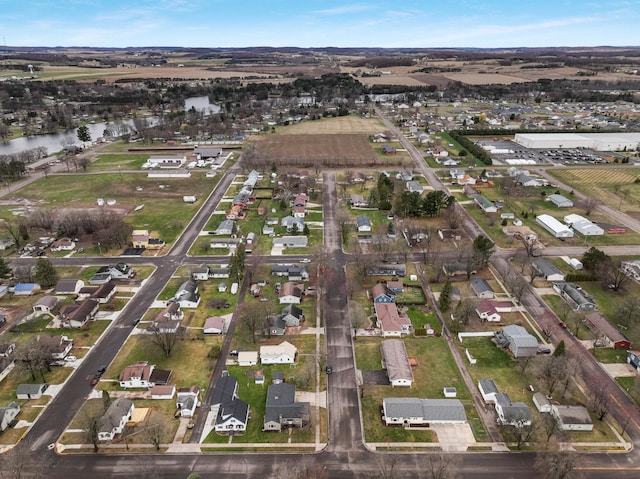 aerial view with a residential view and a water view