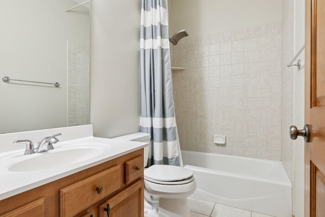 bathroom with toilet, tile patterned flooring, shower / bath combo, and vanity