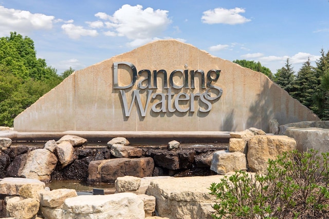 view of community sign
