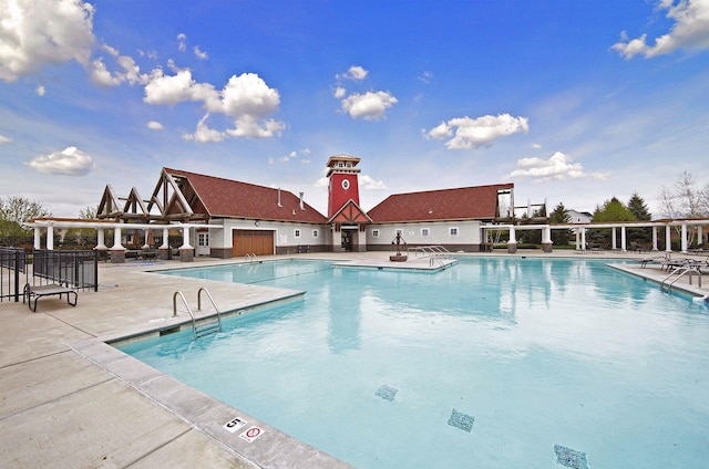 pool with a patio area