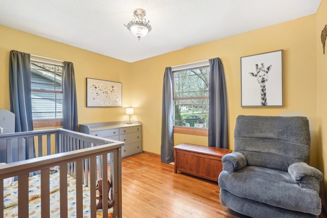 bedroom with light wood-type flooring