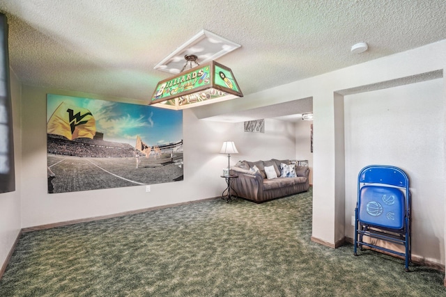 interior space with carpet flooring, a textured ceiling, and baseboards