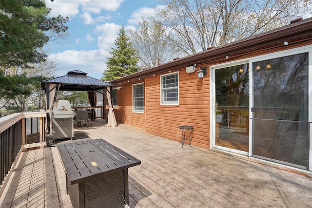 wooden terrace with a gazebo