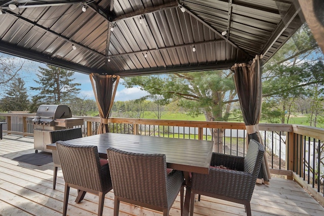 wooden deck featuring a gazebo