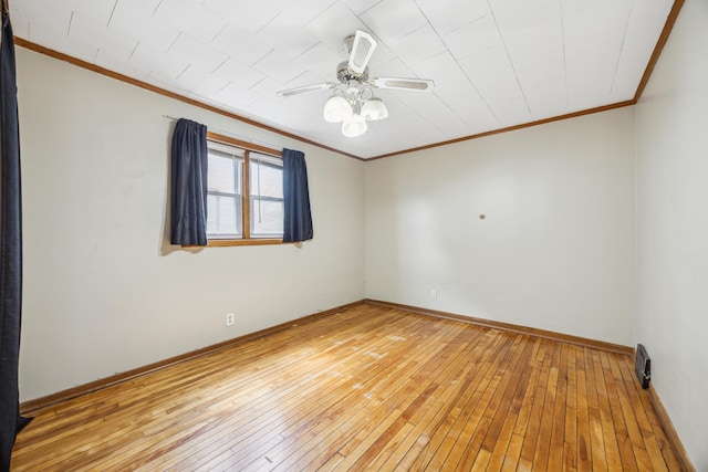 1622 Washington St NE, Minneapolis, MN 55413 - empty room with light wood-type flooring, a ceiling fan, baseboards, and ornamental molding