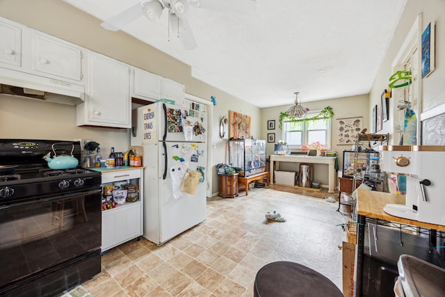 1622 Washington St NE, Minneapolis, MN 55413 - kitchen with under cabinet range hood, black range with gas stovetop, white cabinetry, freestanding refrigerator, and ceiling fan