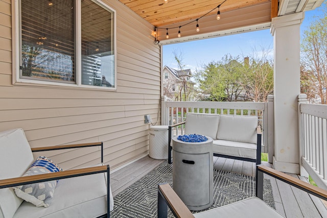 balcony with an outdoor hangout area