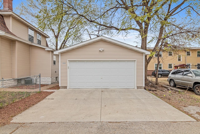 detached garage with fence