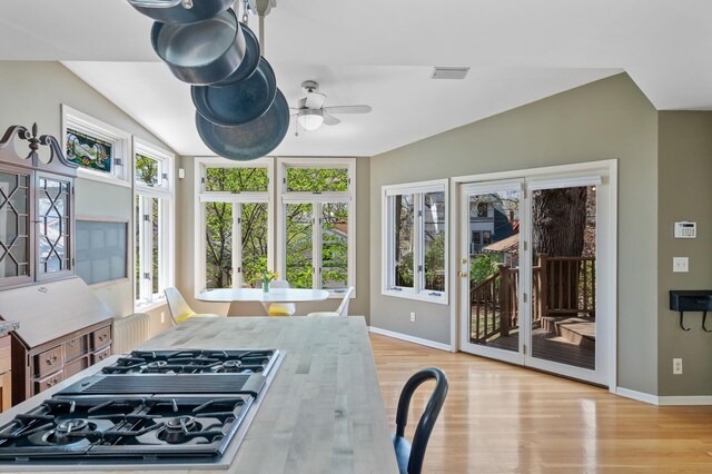 interior space with french doors, a wealth of natural light, and visible vents