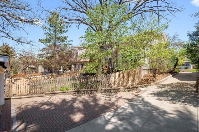 view of patio / terrace featuring fence