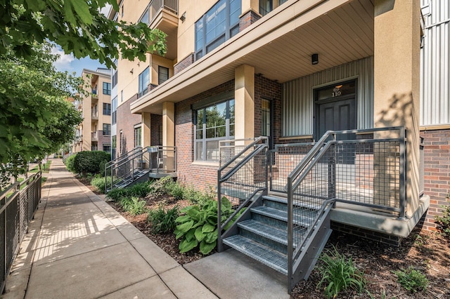 820 Emerald St Unit 110, Saint Paul, MN 55114 - entrance to property featuring brick siding and stucco siding