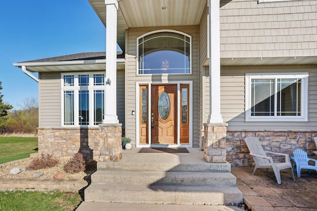 710 Rush Creek Ln, Rush City, MN 55069 - doorway to property with stone siding