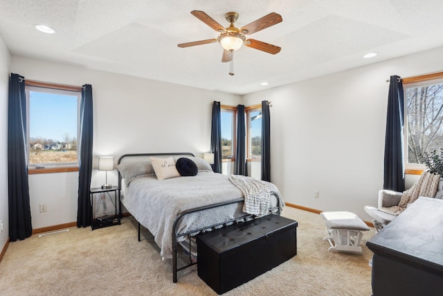 710 Rush Creek Ln, Rush City, MN 55069 - carpeted bedroom with baseboards, a ceiling fan, recessed lighting, and visible vents