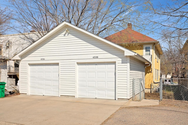 detached garage with fence