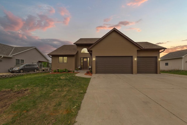 29107 Danel Ave, Randolph, MN 55065 - view of front of house with concrete driveway, a garage, and a yard