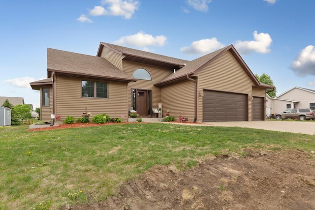 29107 Danel Ave, Randolph, MN 55065 - view of front facade with an attached garage, concrete driveway, a front yard, and roof with shingles
