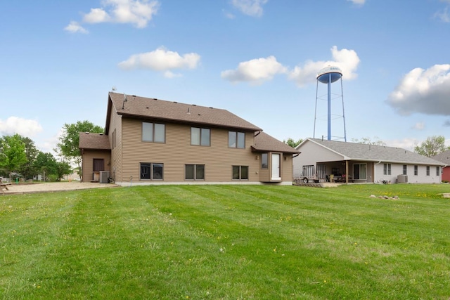 29107 Danel Ave, Randolph, MN 55065 - back of property featuring a yard and central AC unit
