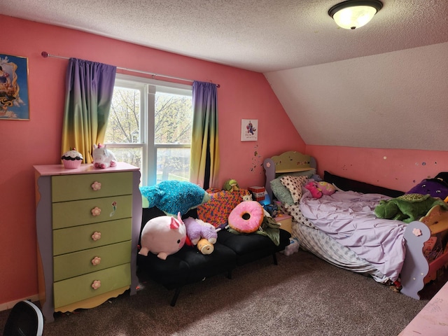 bedroom featuring carpet, vaulted ceiling, and a textured ceiling