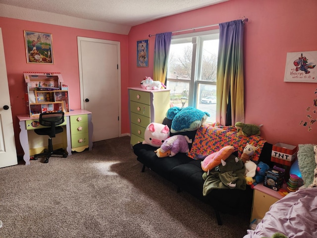 carpeted bedroom featuring a textured ceiling