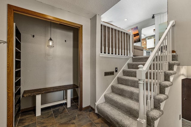 1302 Birch Dr, Hudson, WI 54016 - mudroom with baseboards and stone finish flooring
