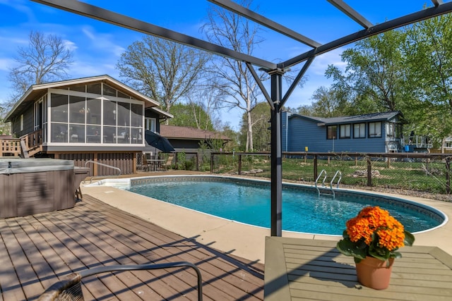 1302 Birch Dr, Hudson, WI 54016 - view of pool featuring a sunroom, a hot tub, fence, and a deck