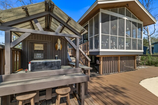 1302 Birch Dr, Hudson, WI 54016 - wooden terrace featuring a sunroom and stairway