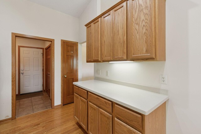 2117 14th St NE, Faribault, MN 55021 - kitchen featuring light countertops and light wood-style floors