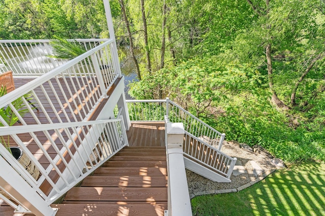 5761 Sunnybrook Ln, Minnetrista, MN 55364 - wooden deck featuring stairs and a view of trees